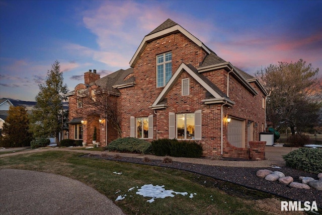 view of front of home with a garage