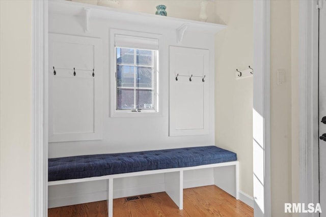 mudroom with hardwood / wood-style flooring