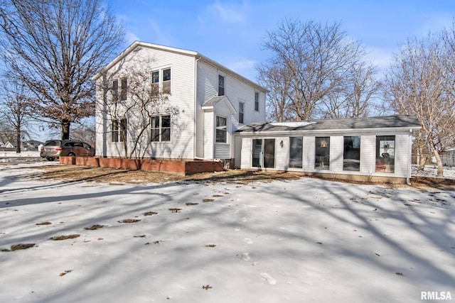 view of snow covered property