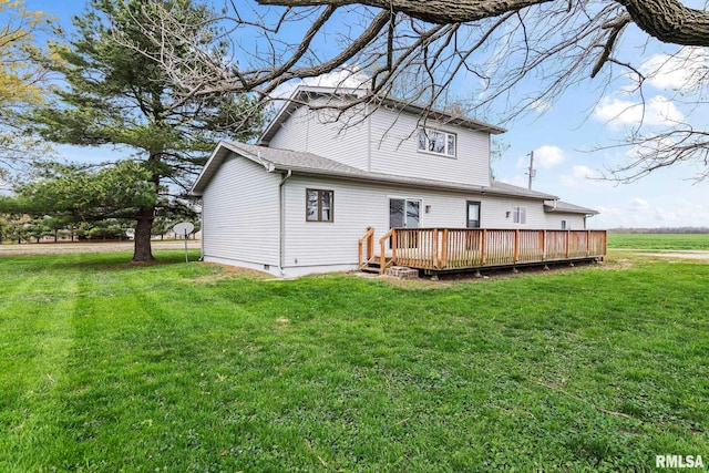 34187 E 6th Rd, Pawnee, IL 62558 - back of property featuring a lawn and a deck