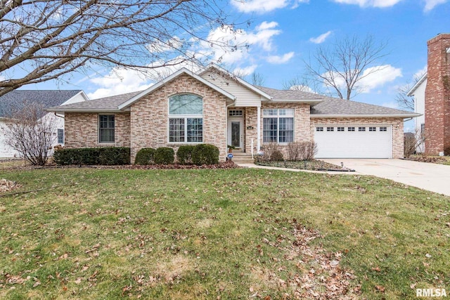 single story home featuring a garage and a front lawn