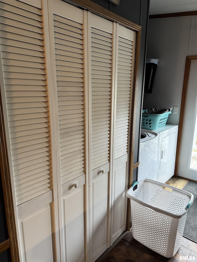 laundry room with washer and dryer