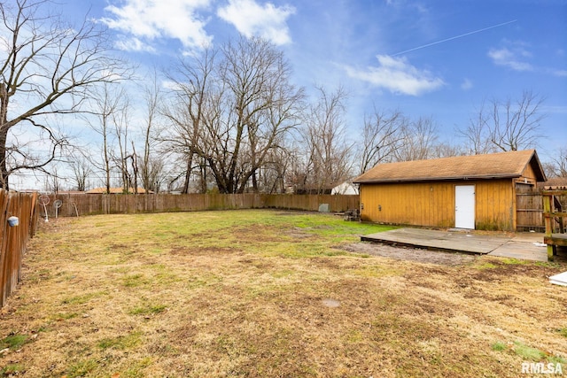 view of yard with an outdoor structure and a deck