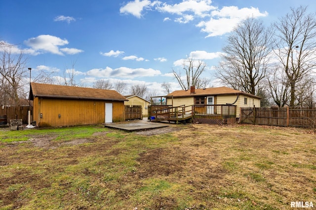 view of yard featuring a wooden deck