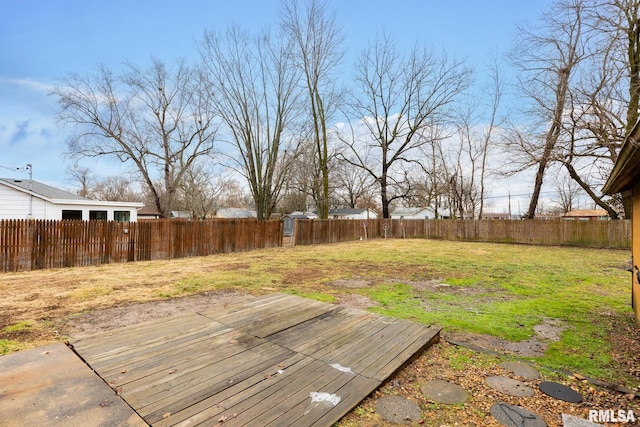 view of yard with a wooden deck