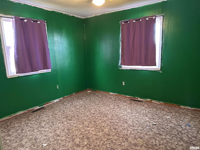 empty room featuring carpet floors