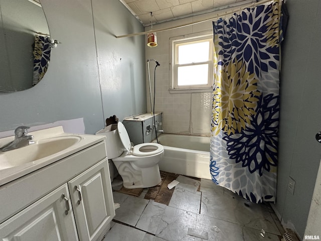 full bathroom with vanity, shower / bath combination with curtain, and toilet