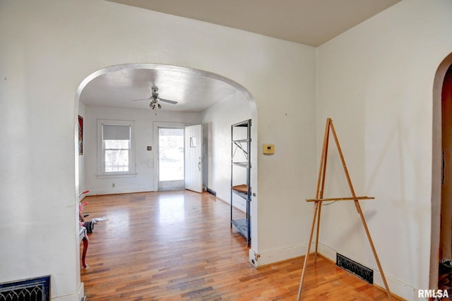 entrance foyer featuring hardwood / wood-style flooring and ceiling fan