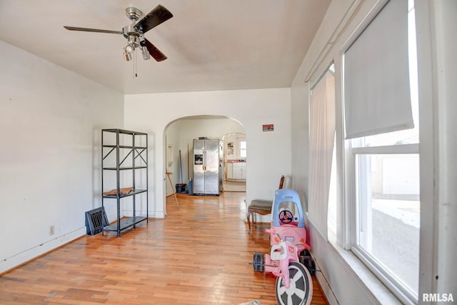 game room featuring light hardwood / wood-style floors and ceiling fan