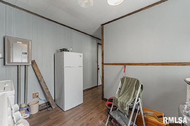 1405 Pekin St, Lincoln, IL 62656 - miscellaneous room with electric panel, wood finished floors, and crown molding