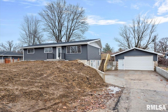 ranch-style house with an outbuilding and a garage