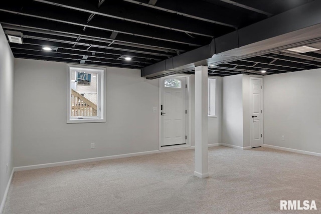 basement with light carpet