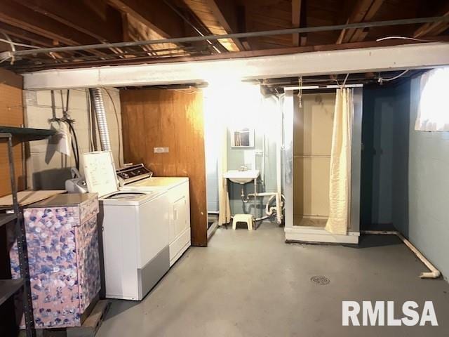 basement featuring washing machine and dryer