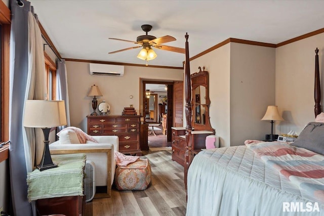 bedroom with hardwood / wood-style flooring, ceiling fan, a wall mounted air conditioner, and crown molding