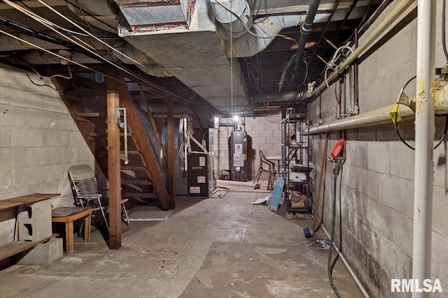 basement with gas water heater and heating unit