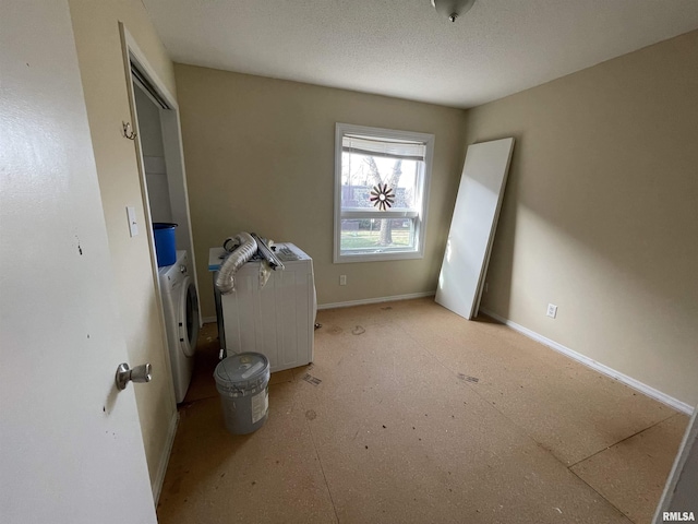 interior space with a textured ceiling