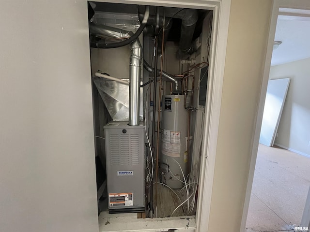 utility room with water heater