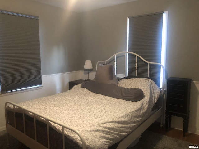 bedroom featuring dark wood-type flooring