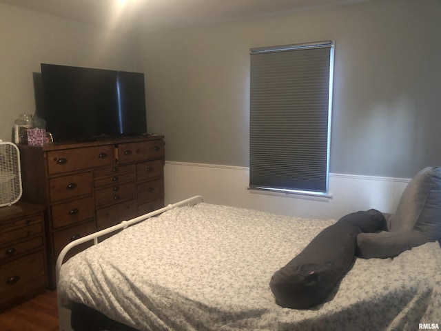 bedroom featuring dark wood-type flooring