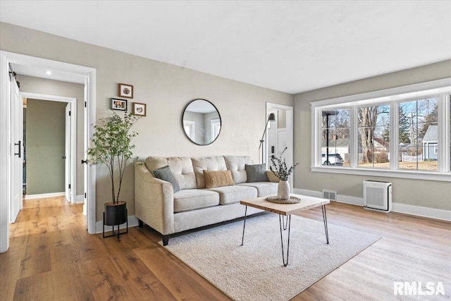 living room with hardwood / wood-style flooring