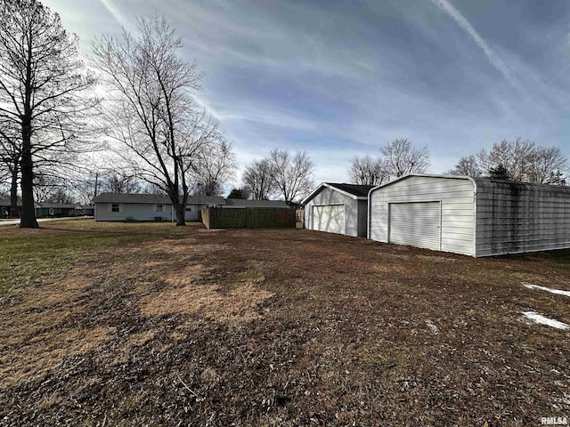 view of yard featuring a garage