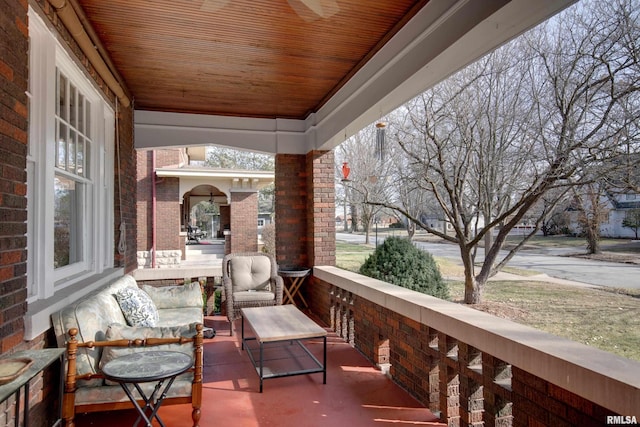 balcony featuring a porch