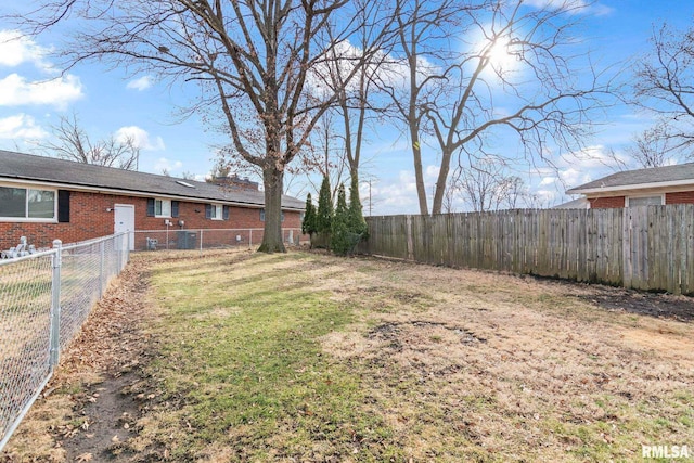 view of yard featuring central AC