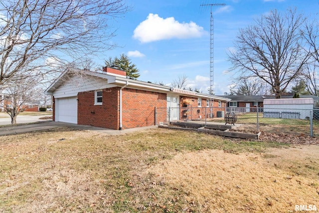 rear view of house with a lawn