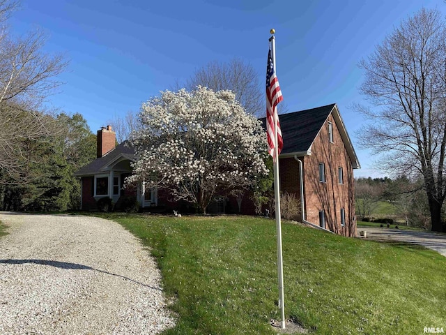 view of front of home featuring a front yard