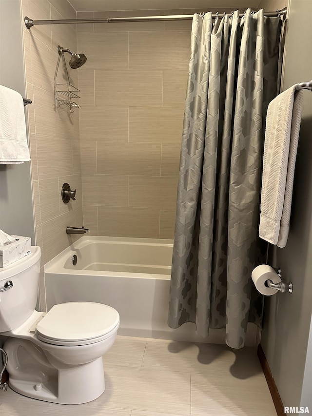 full bathroom with toilet, tile patterned floors, and shower / tub combo with curtain