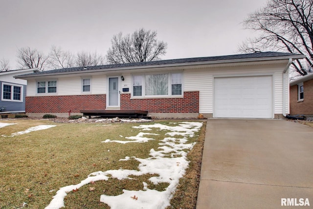 ranch-style home featuring a garage and a front lawn