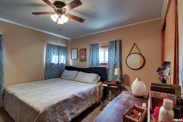 bedroom featuring crown molding and ceiling fan