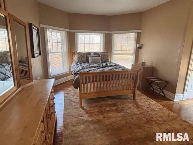 bedroom featuring hardwood / wood-style floors