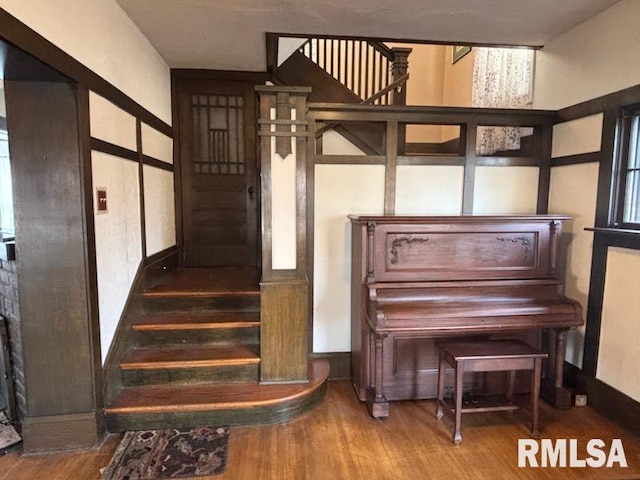 2340 Maine St, Quincy, IL 62301 - stairway featuring wood finished floors