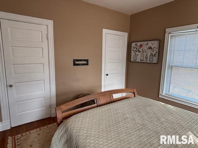 bedroom featuring hardwood / wood-style floors