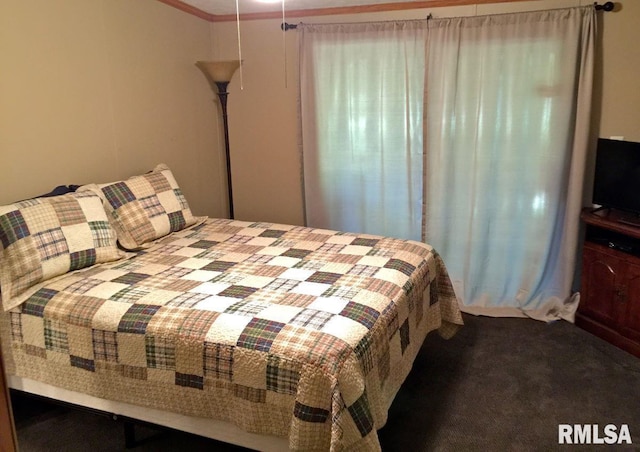 carpeted bedroom featuring ornamental molding