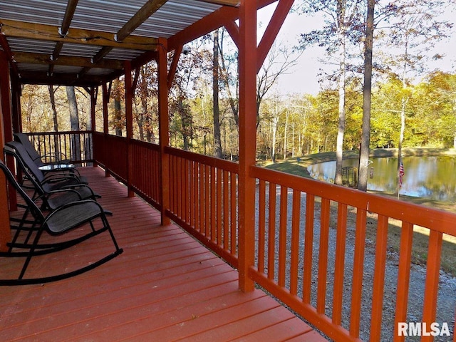 wooden terrace with a water view