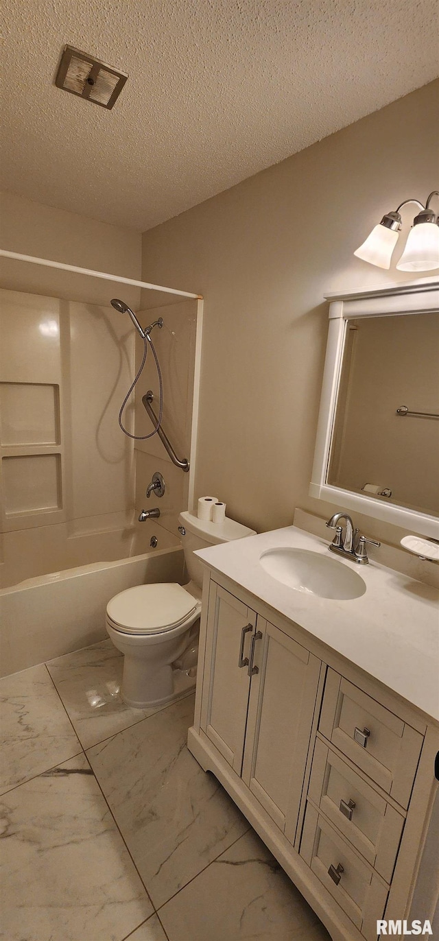 full bathroom featuring shower / bathtub combination, vanity, toilet, and a textured ceiling