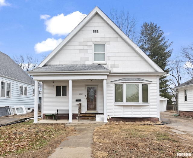 bungalow-style home with covered porch