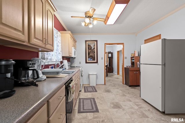 kitchen featuring sink, white appliances, ceiling fan, ornamental molding, and light brown cabinetry