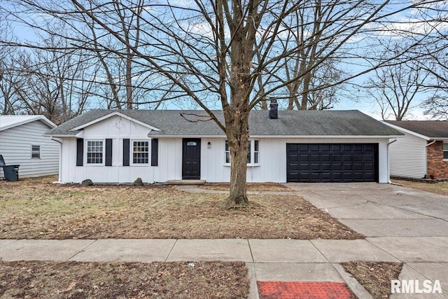 ranch-style home featuring an attached garage, a shingled roof, concrete driveway, board and batten siding, and a chimney