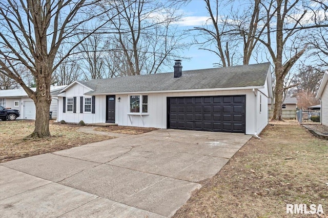 single story home featuring a garage