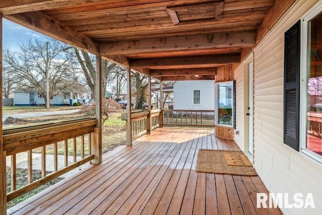 wooden deck featuring a porch