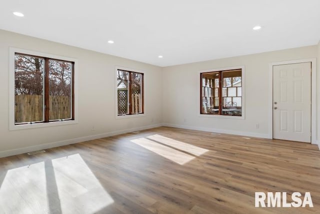 empty room featuring light hardwood / wood-style floors