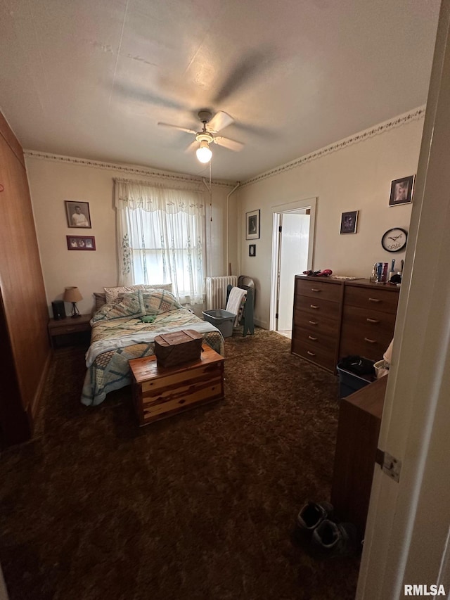 bedroom featuring ceiling fan and carpet flooring