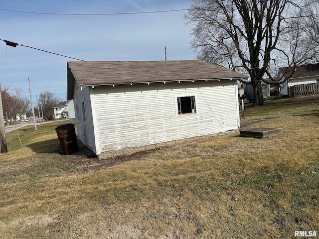 garage with a lawn