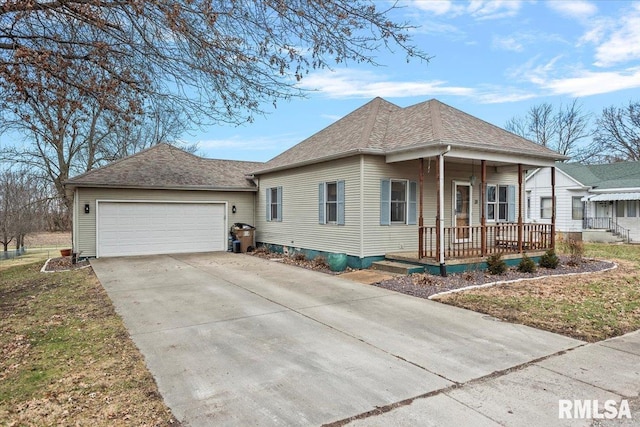 view of front of house with a garage and a porch