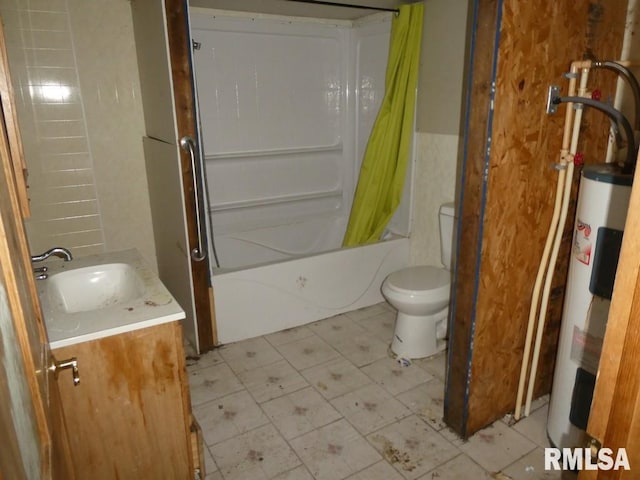 full bathroom featuring vanity, toilet, electric water heater, and shower / bath combo