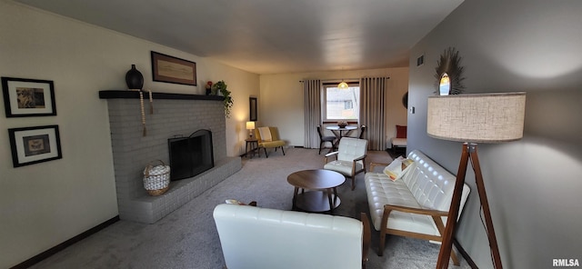 living room featuring carpet and a fireplace