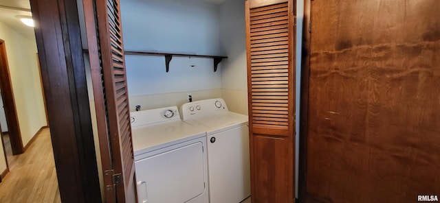 laundry area with independent washer and dryer